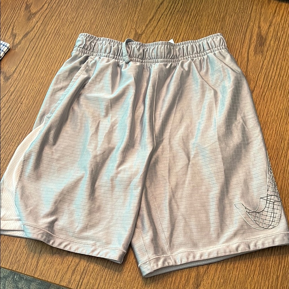 Boy’s gray Nike shorts.
